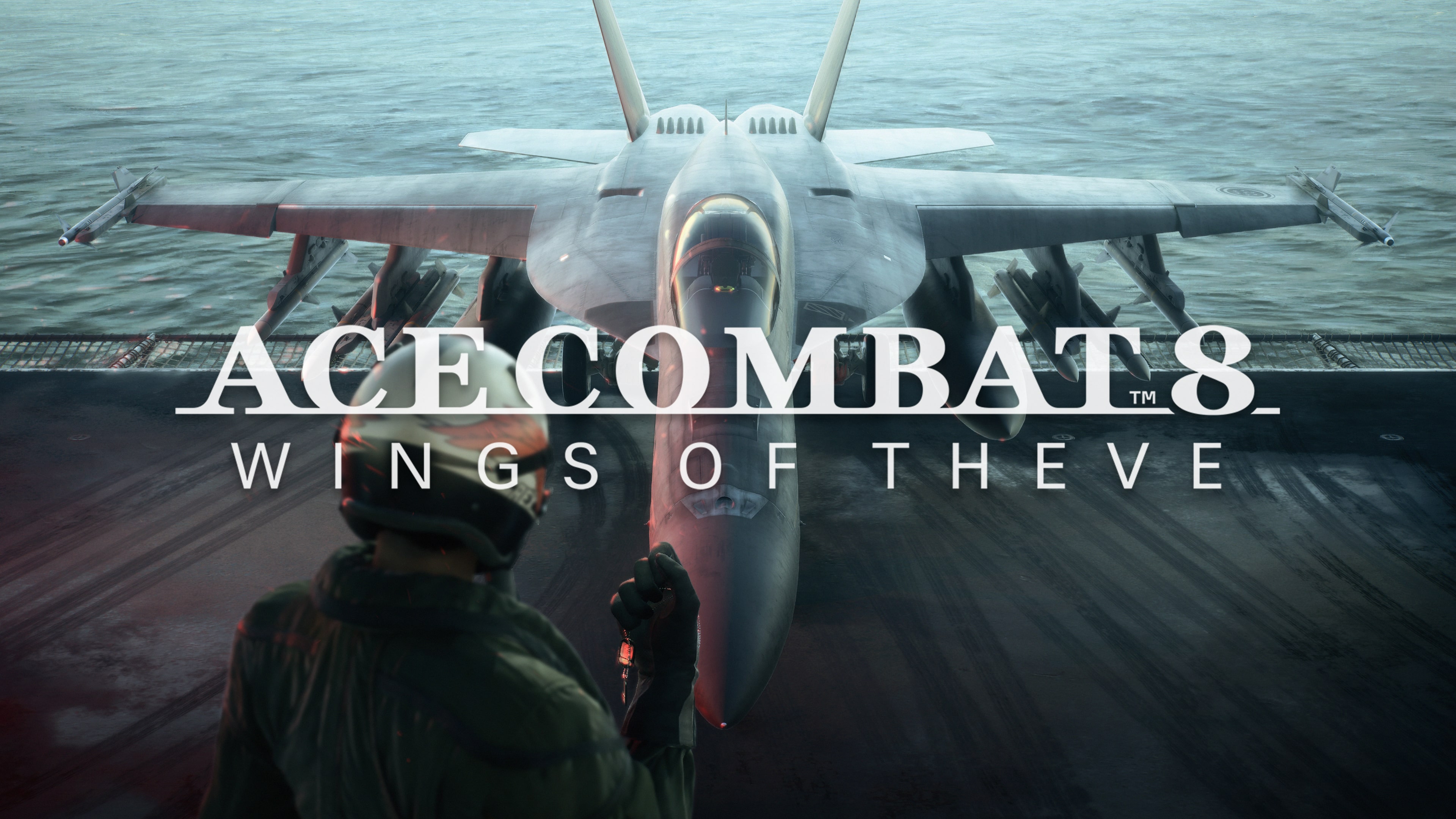 Caça militar cinza visto de frente no convés de um porta-aviões, com piloto de capacete e macacão de costas em primeiro plano e mar ao fundo com o logotipo Ace Combat 8 Wings of Theve em branco ao centro